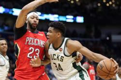 爱游戏tv-鹈鹕轻取上海队，字母哥高光表现